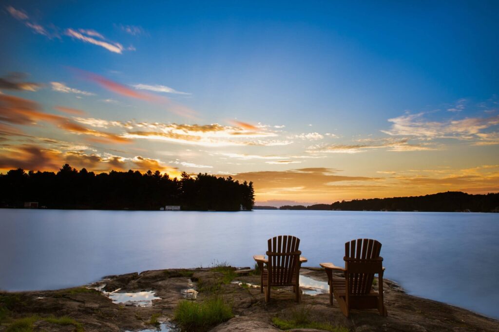 empty chairs on seashore